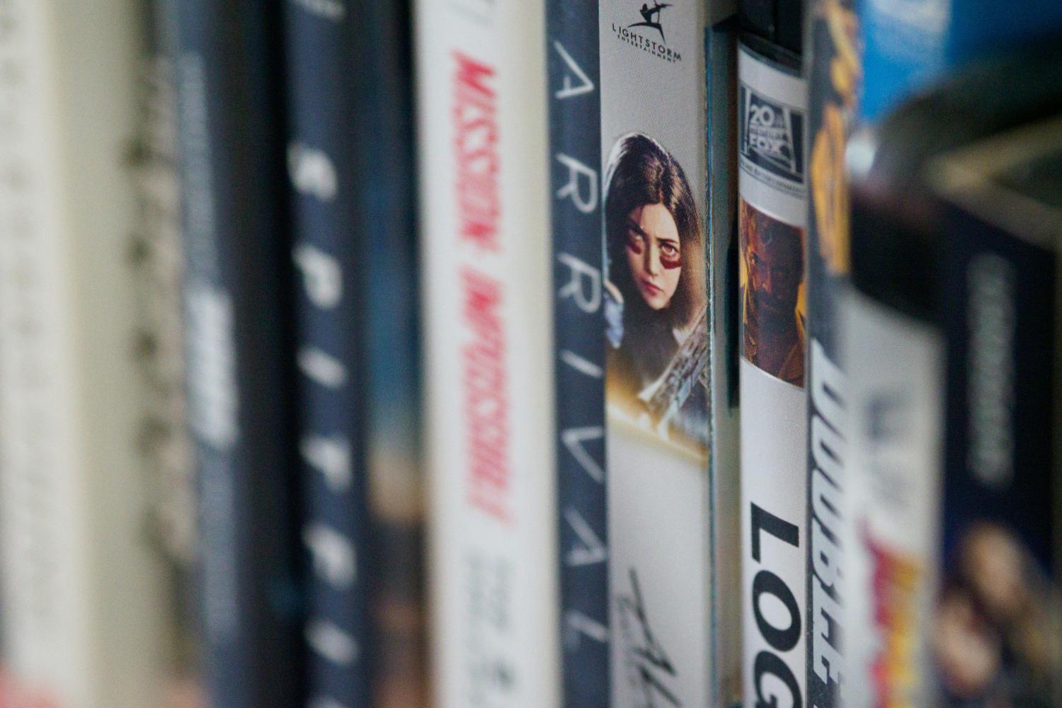 Close up of DVDs on a shelf