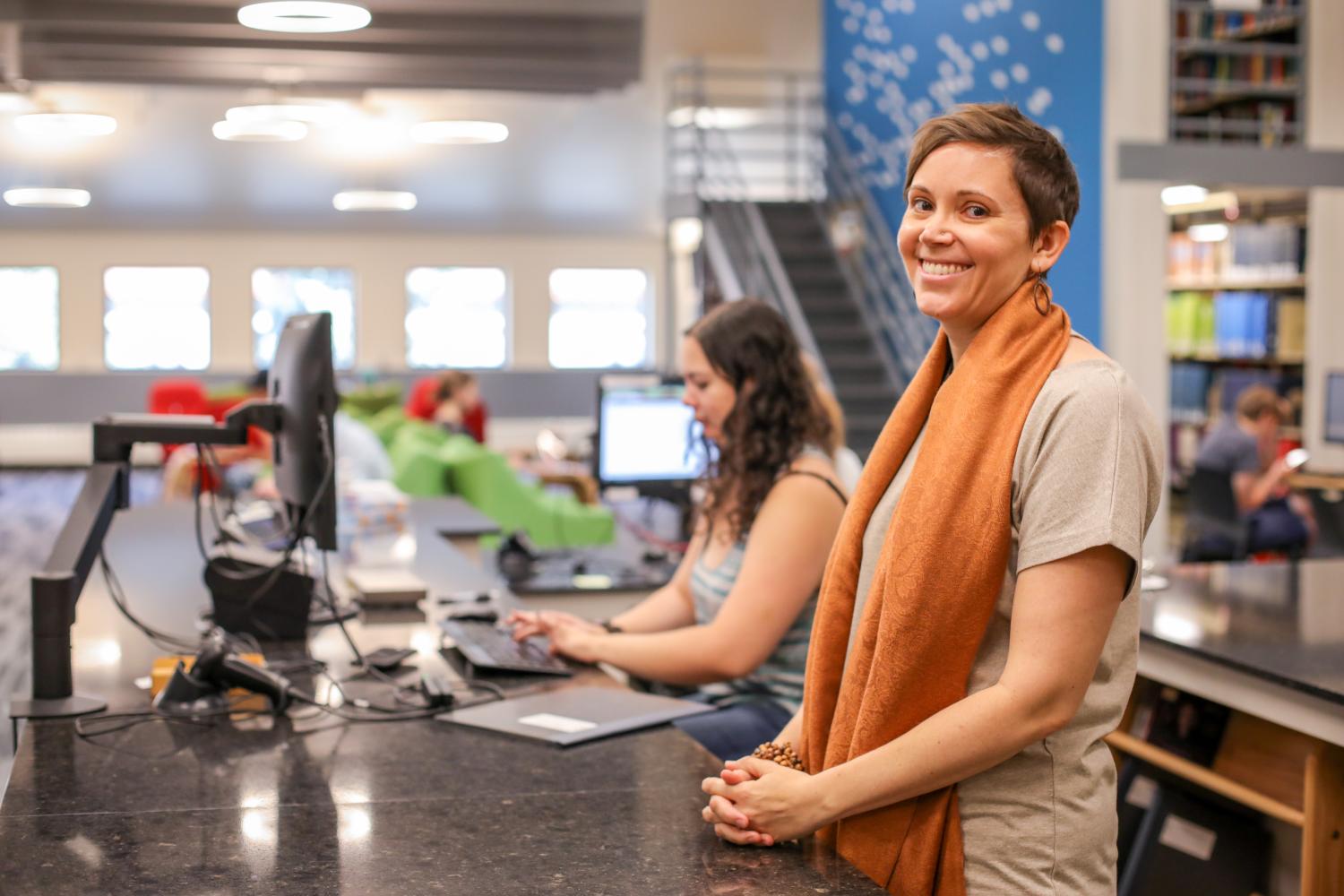 Music Librarian Stephanie Bonjack standing at the Music Library service desk