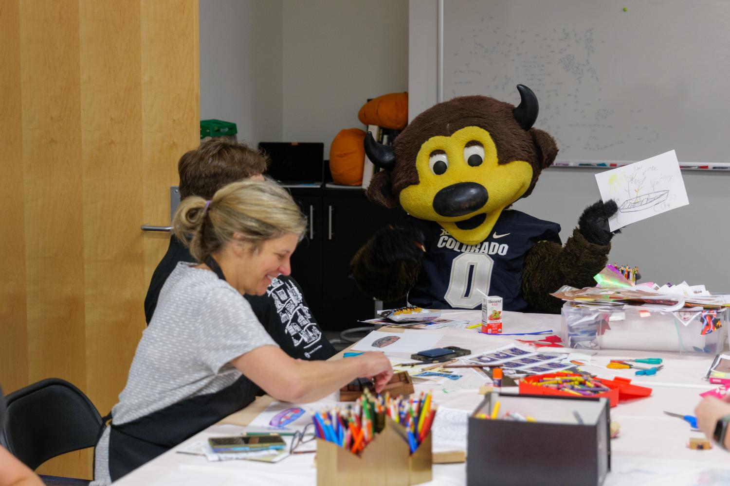 Chip holding up his drawing