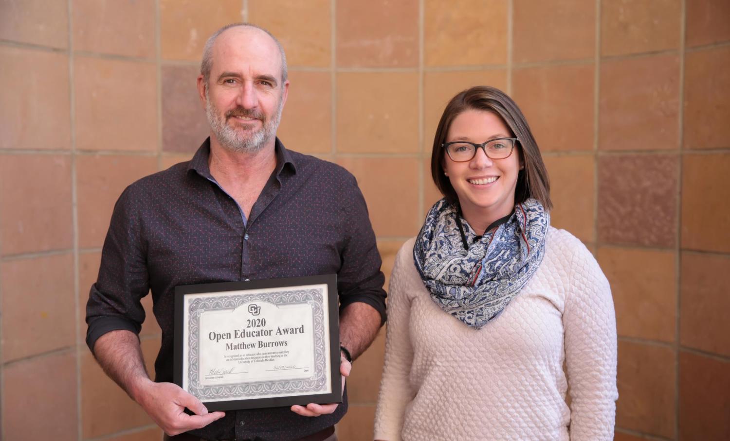 Lecturer Matthew Burrows with Scholarly Communication Librarian Melissa Cantrell.