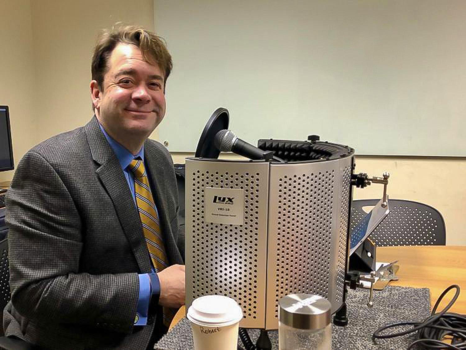 Dean of the University Libraries Robert H. McDonald in the Earth Sciences & Map Library's pop-up studio.