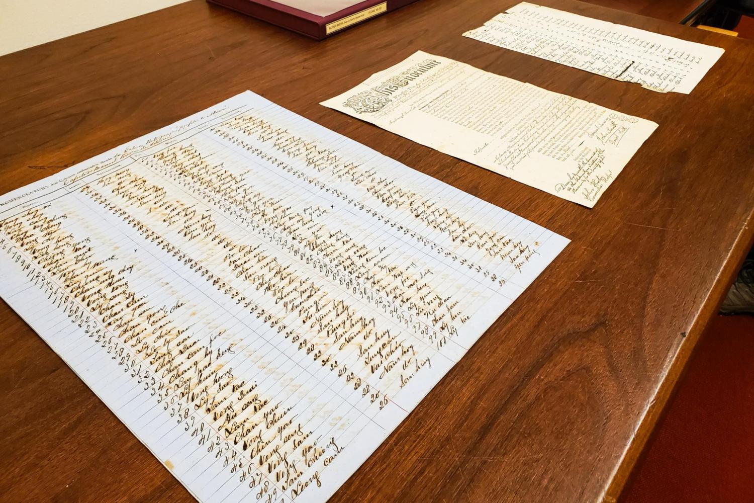 Indentured servitude contract and list of enslaved people documents