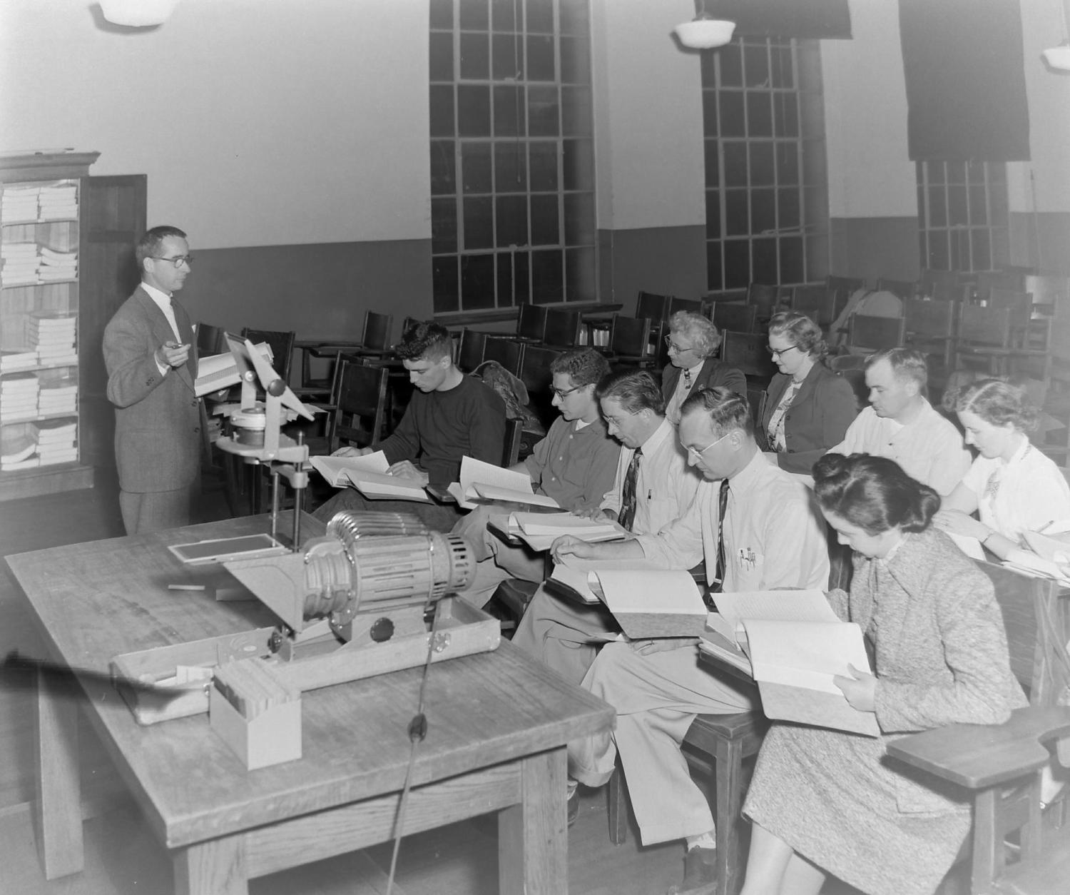 Students reading in class in the 1950s.