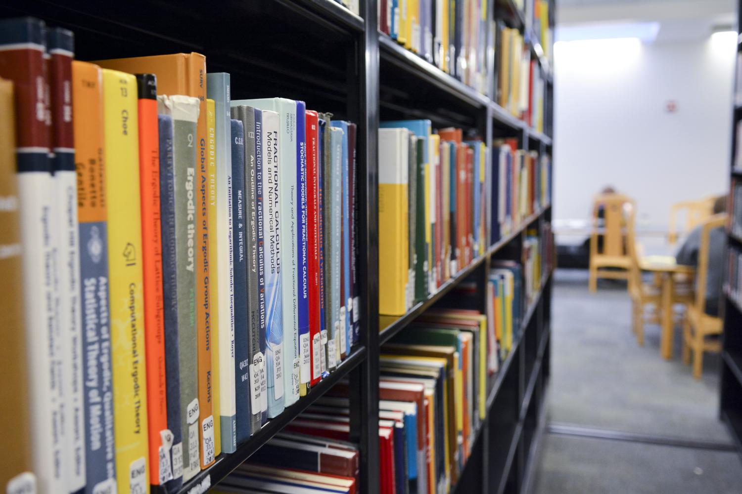 Books along a library shelf in Gemmill