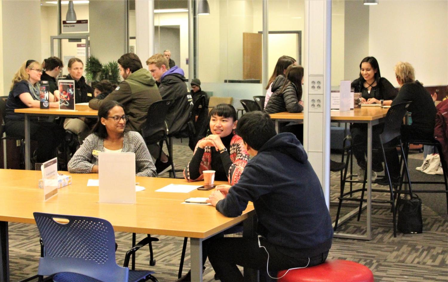 Readers engaged in dialogue with Readers and Monitors in Norlin Commons on Wednesday. 